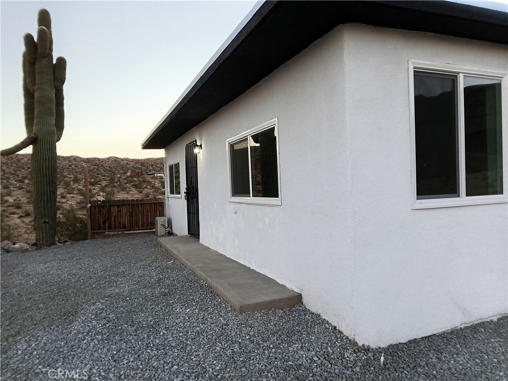 66954 Appian Way Joshua Tree, CA 92252 - Photo 3 of 26 a view of a house with a balcony