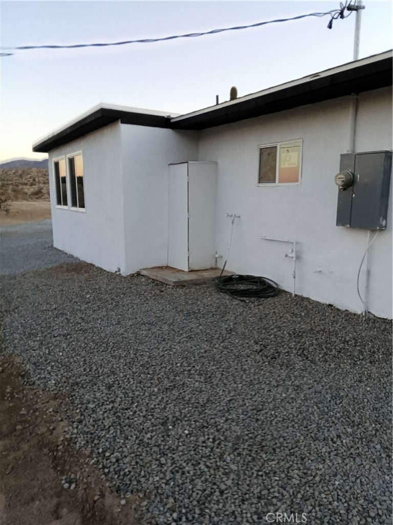 66954 Appian Way Joshua Tree, CA 92252 - Photo 7 of 26 a house with a outdoor space