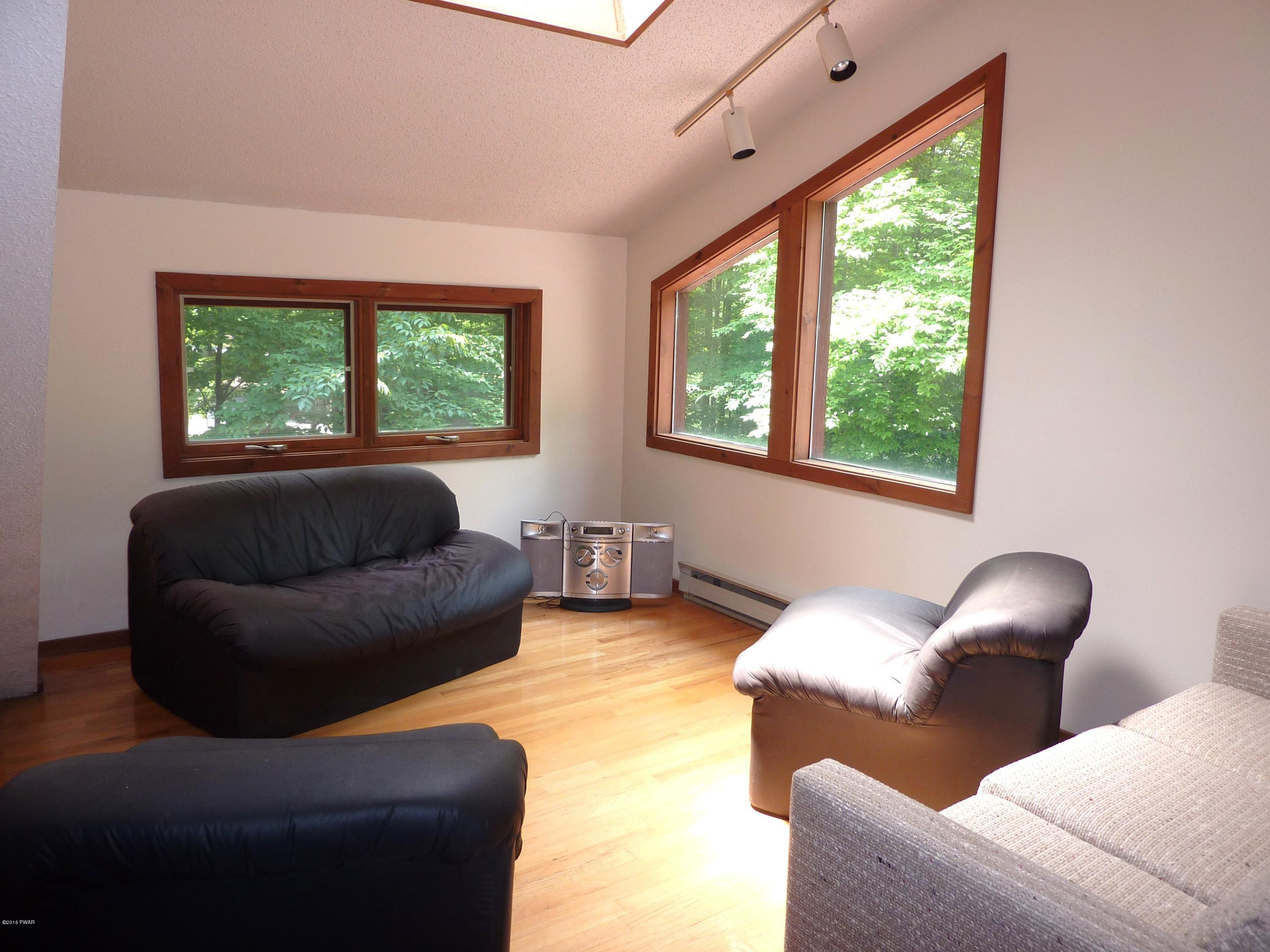 106 Valley Run Road Greentown, PA 18426 - Photo 9 of 21 a living room with furniture and a large window