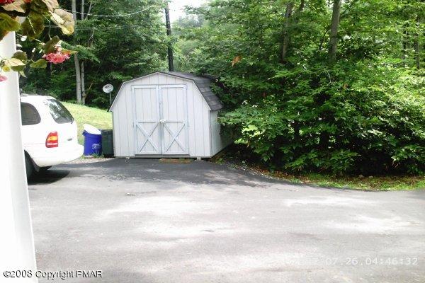 2701 Devon Road Tobyhanna, PA 18466 - Photo 5 of 10 a view of backyard with a barn and a cactus plant