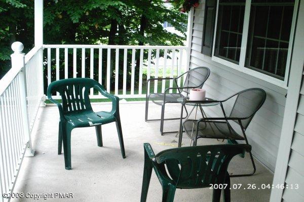 2701 Devon Road Tobyhanna, PA 18466 - Photo 6 of 10 a view of balcony with wooden floor and outdoor seating