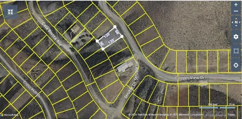 a bathroom with a sink and glass door