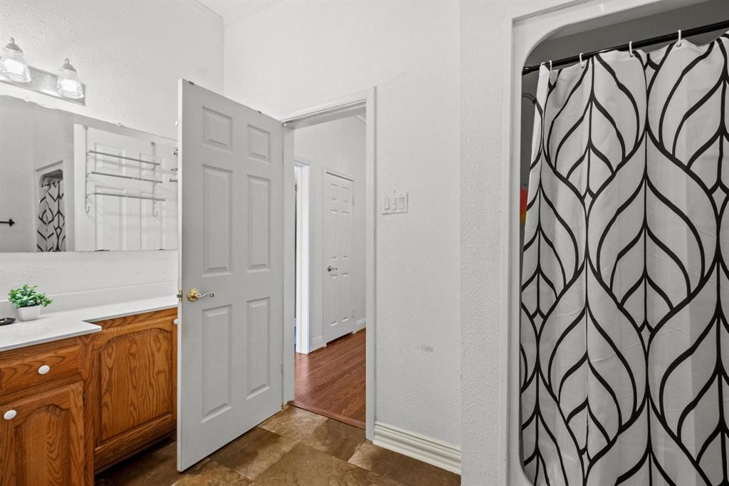715 East 5th Street Ferris, TX 75125 - Photo 25 of 40 a view of a storage and utility room with cabinets