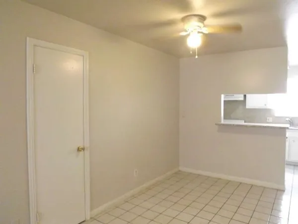 a kitchen with a stove and a sink