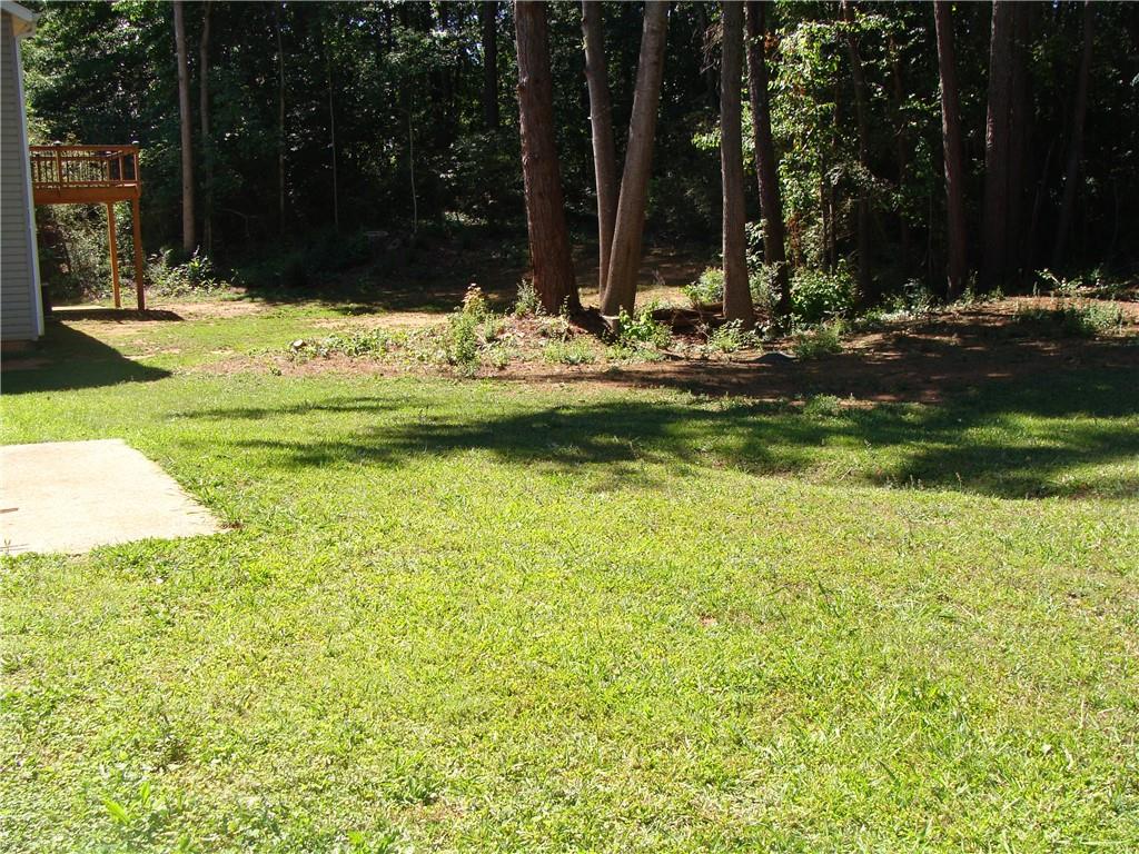 2331 Newgate Drive Decatur, GA 30035 - Photo 33 of 33 a view of swimming pool with a yard and trees