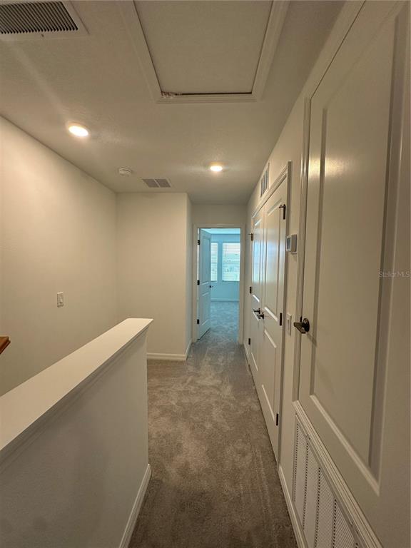 3137 Skyline Loop Kissimmee, FL 34758 - Photo 3 of 14 a view of hallway