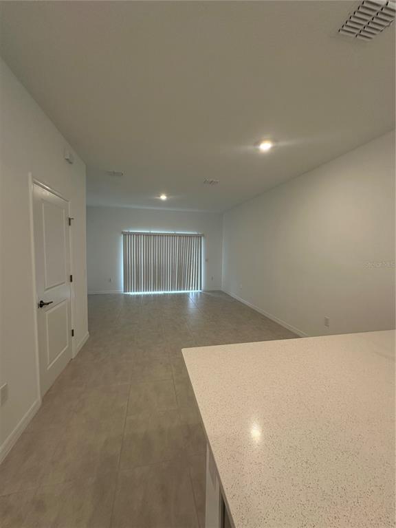 3137 Skyline Loop Kissimmee, FL 34758 - Photo 8 of 14 a view of an empty room