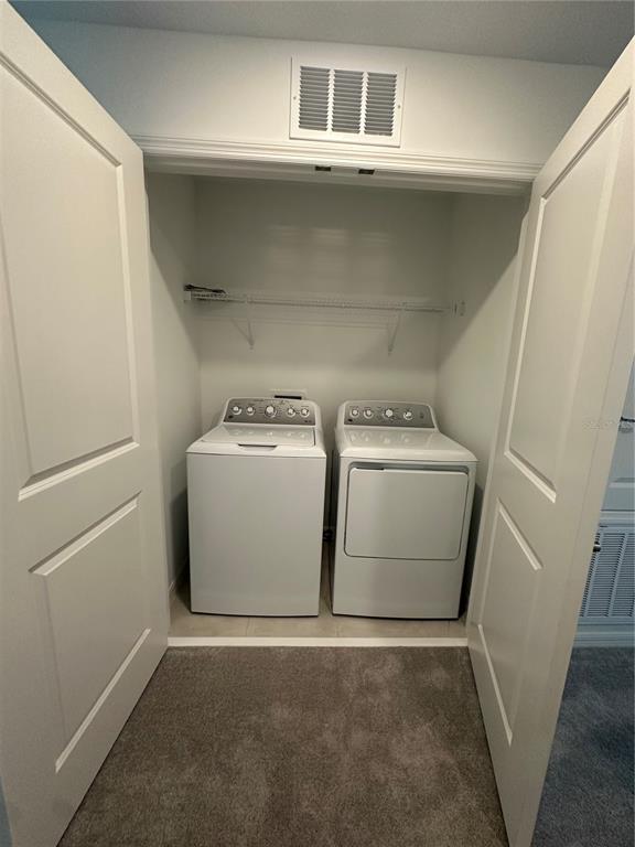 3137 Skyline Loop Kissimmee, FL 34758 - Photo 10 of 14 a utility room with dryer and washer
