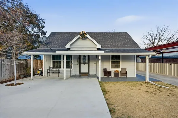 front view of a house with a patio