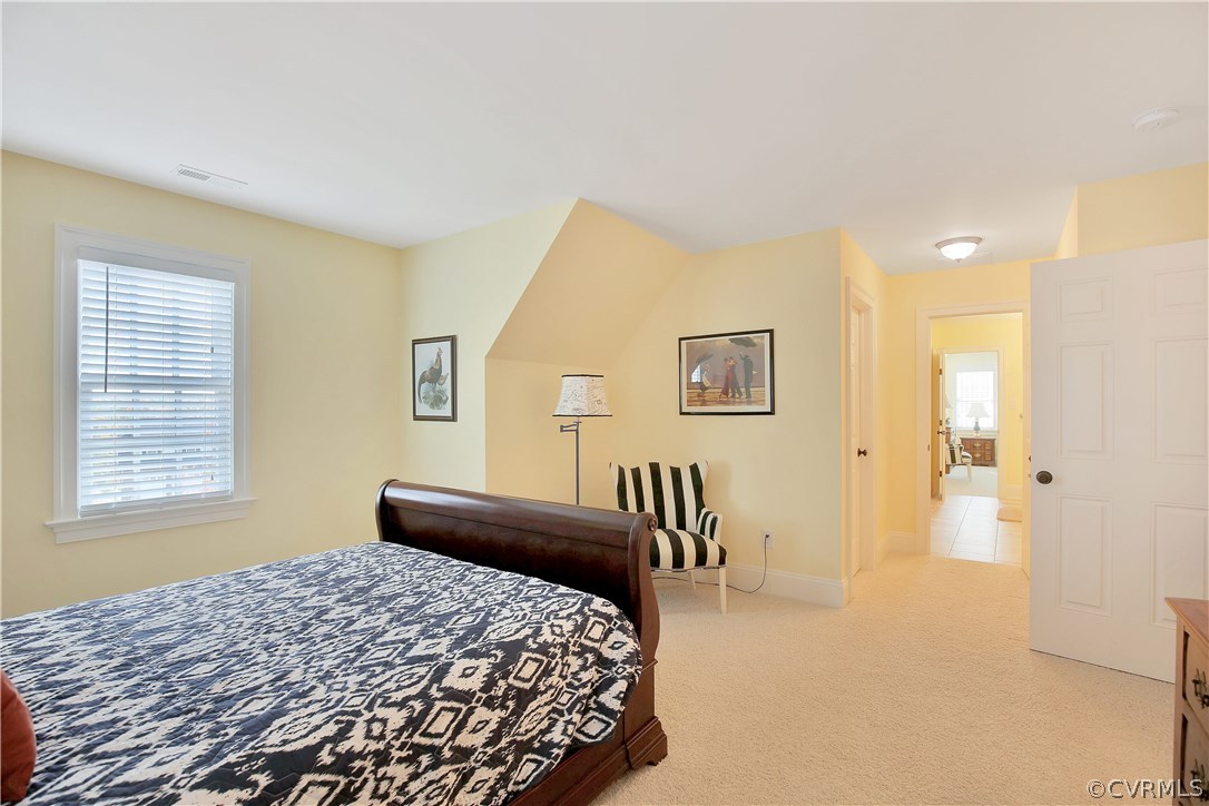3606 Bircham Loop Midlothian, VA 23113 - Photo 18 of 24 a bedroom with a bed and a dresser
