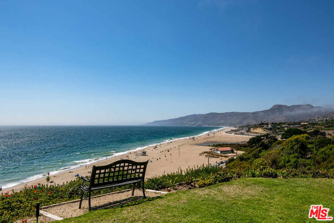 6789 Shearwater Lane Malibu, CA 90265 - Photo 12 of 21 a view of a lake with a mountain