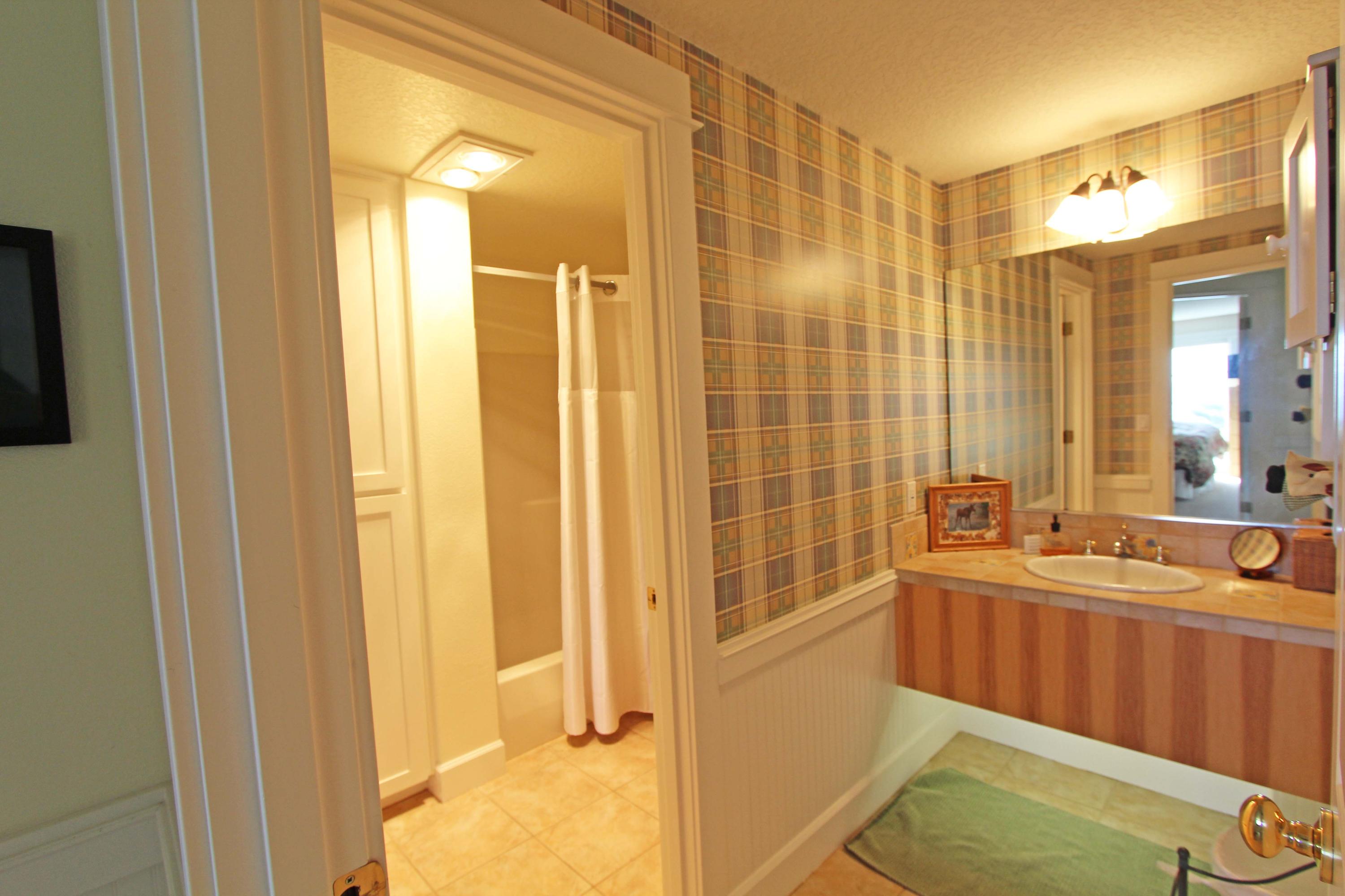 1815 Maxwell Mountain Road Oceanside, OR 97134 - Photo 17 of 26 lower level powder rm