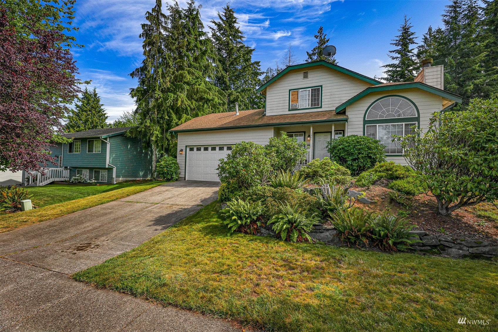 1341 Roma Road Bellingham, WA 98226 - Photo 2 of 40 a front view of a house with garden