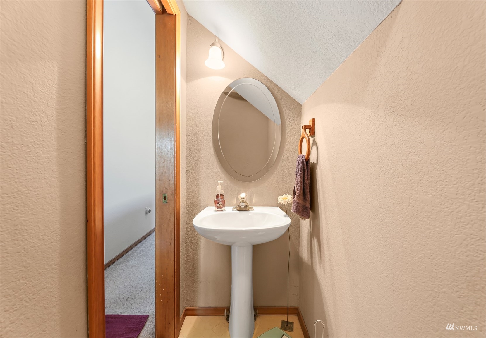 1341 Roma Road Bellingham, WA 98226 - Photo 23 of 40 a bathroom with a sink and a mirror