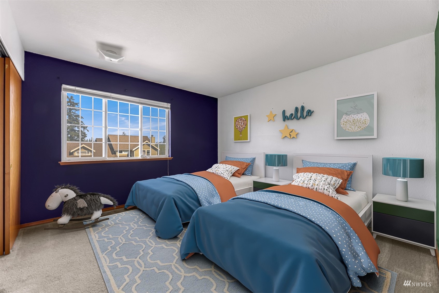 1341 Roma Road Bellingham, WA 98226 - Photo 32 of 40 a bedroom with two beds and a window