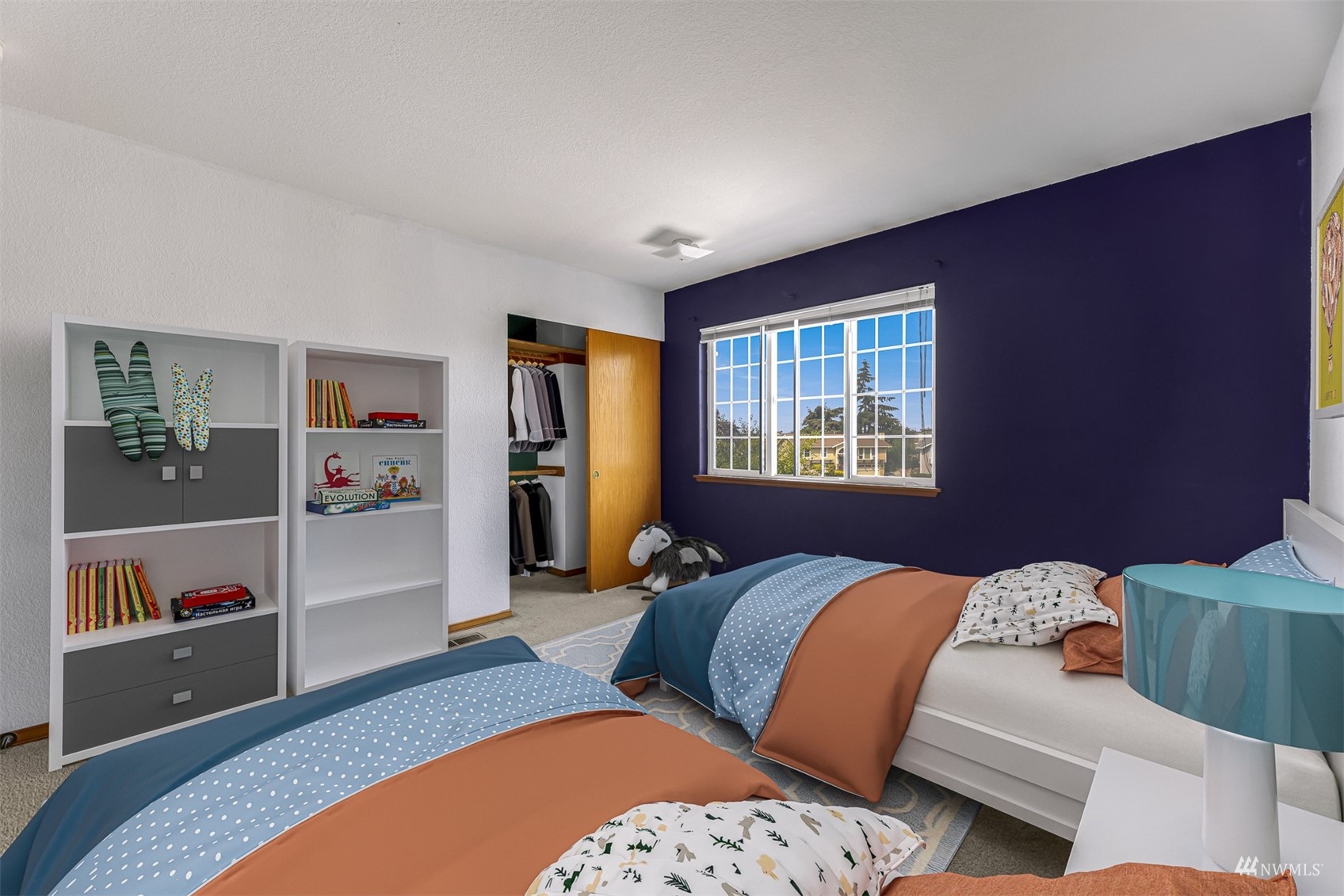 1341 Roma Road Bellingham, WA 98226 - Photo 33 of 40 a bedroom with a large bed and a window