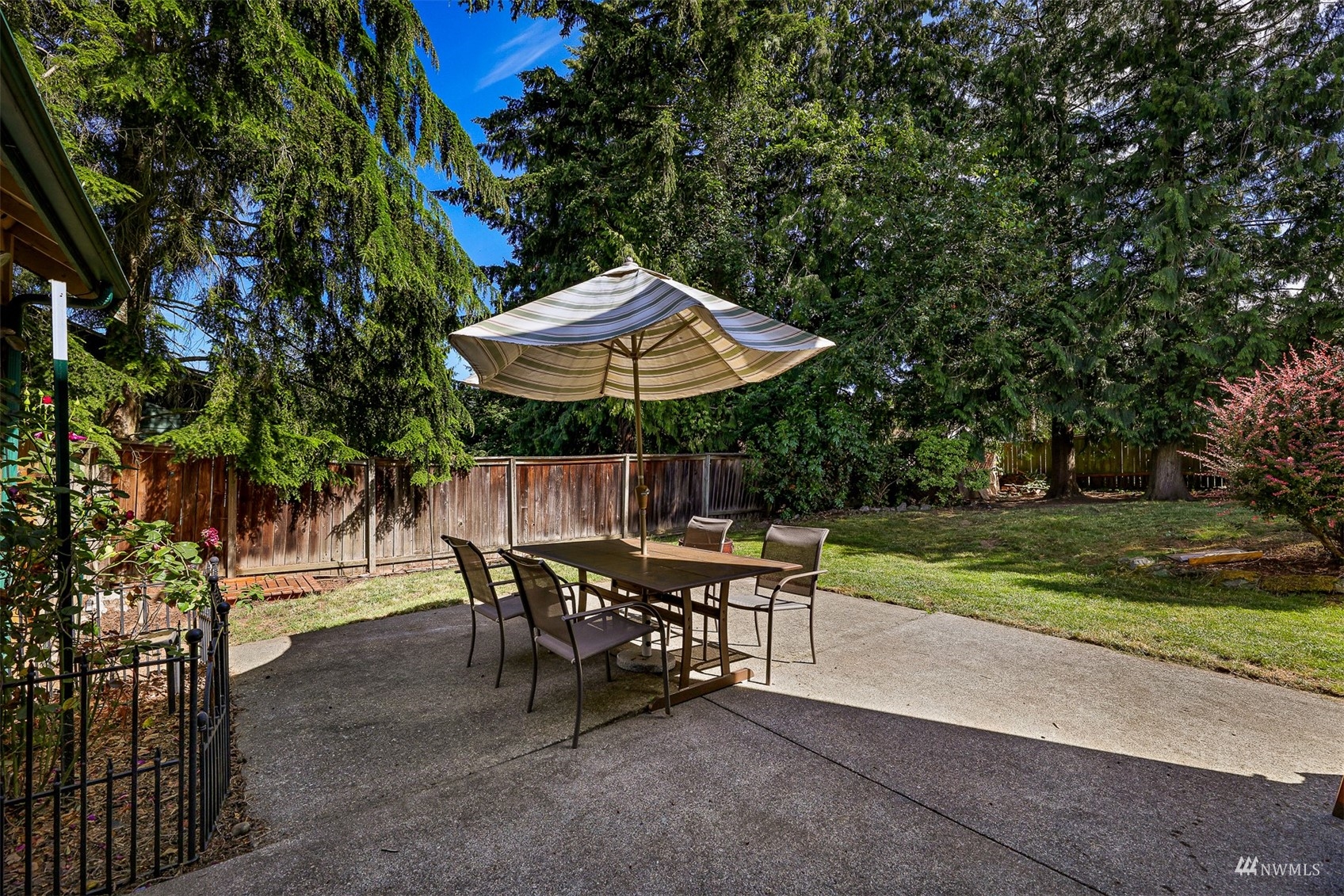1341 Roma Road Bellingham, WA 98226 - Photo 38 of 40 a view of a table and chairs under an umbrella