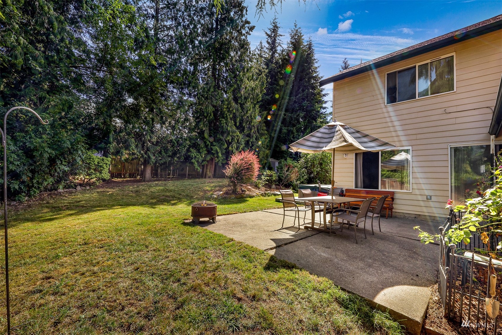 1341 Roma Road Bellingham, WA 98226 - Photo 39 of 40 a view of a house with backyard porch and sitting area