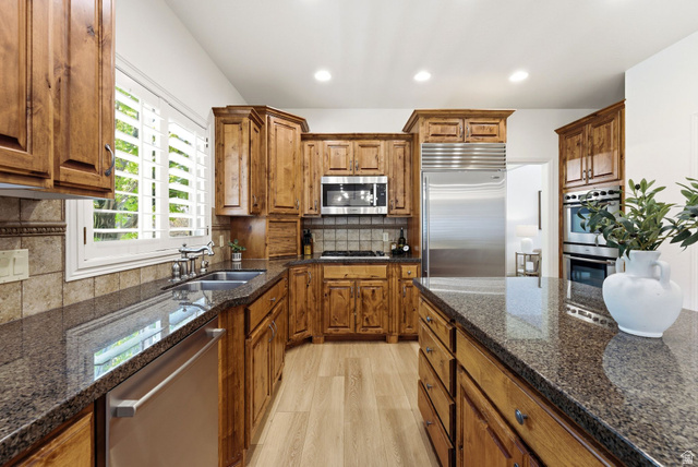 1712 Somerset Ridge Drive Draper, UT 84020 - Photo 22 of 76 Kitchen with wood-finish flooring and recessed lighting