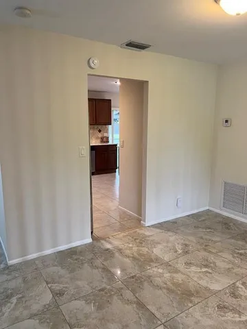 a view of a kitchen and a sink
