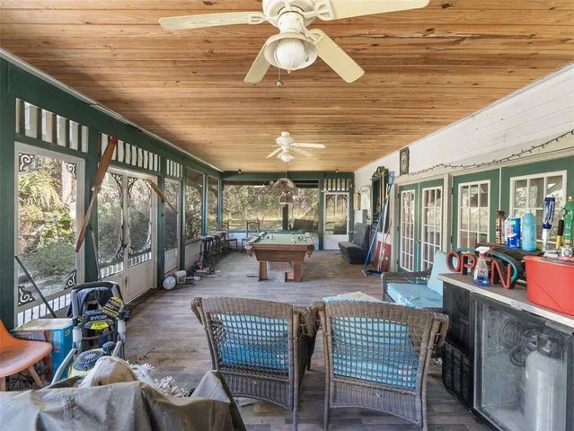 a view of a swimming pool with a patio