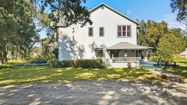 a front view of house with garden