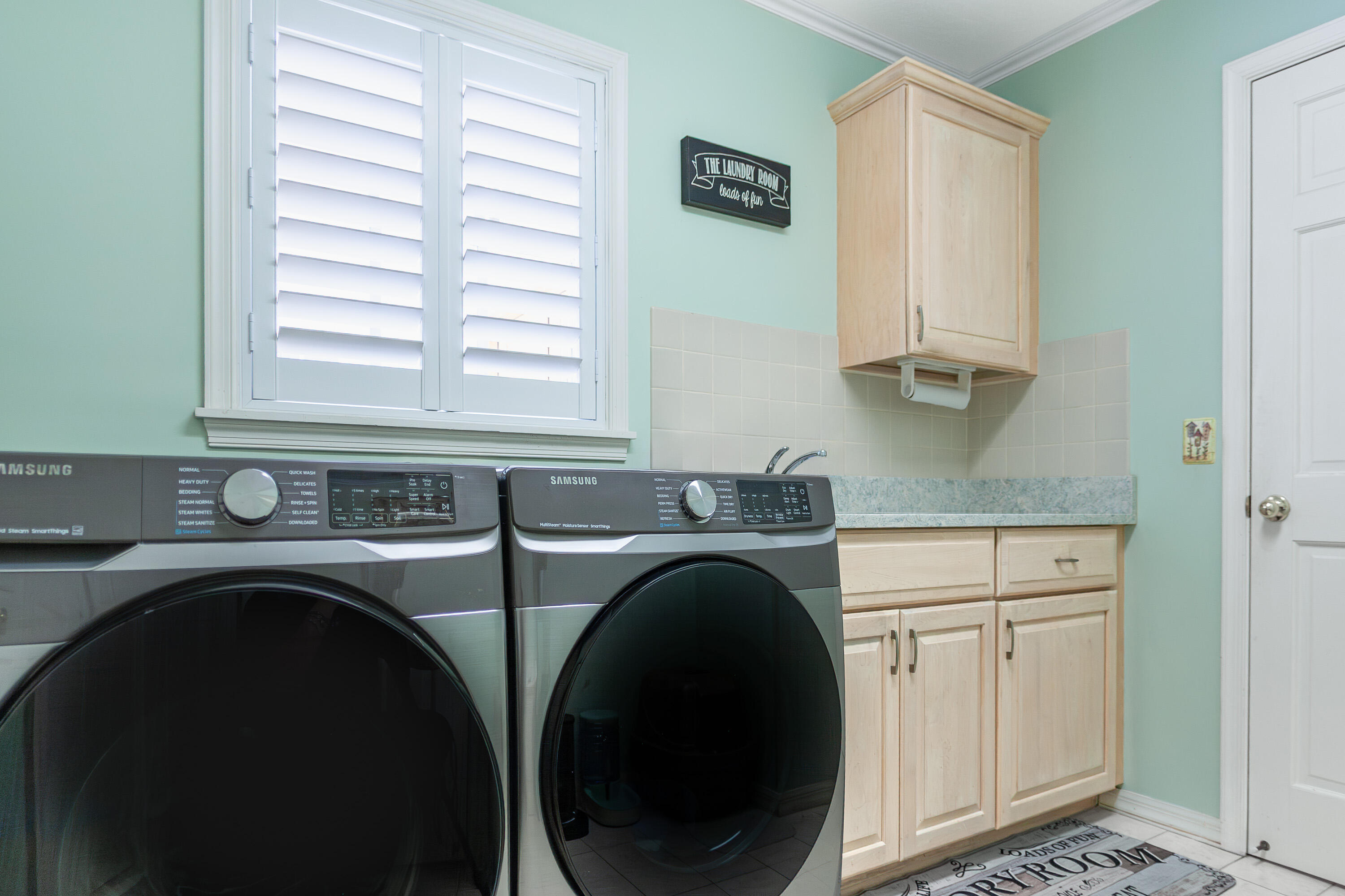 8571 Southeast Quail Ridge Way Hobe Sound, FL 33455 - Photo 24 of 27 19 Laundry