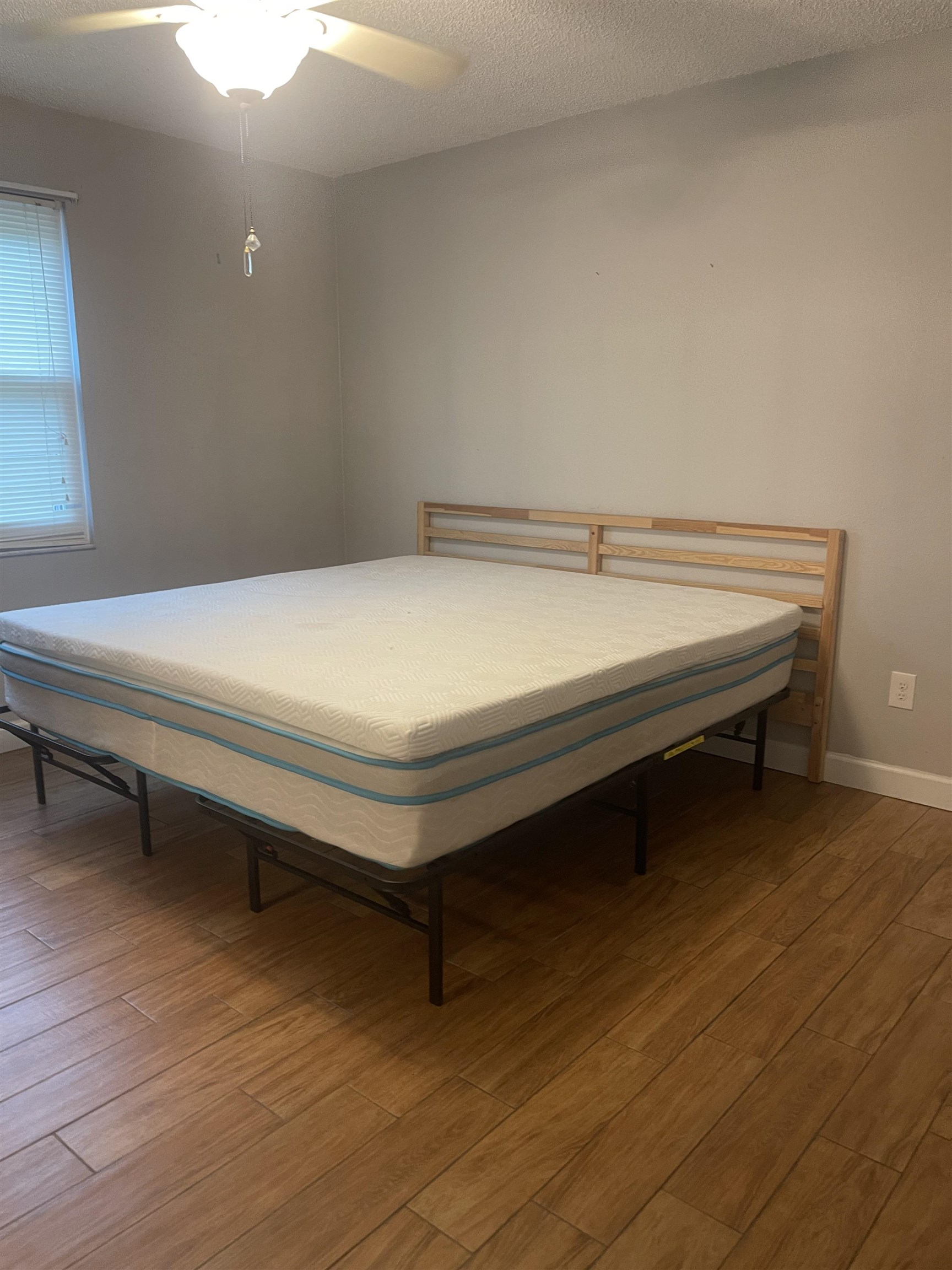 2928 Del Rio Drive St. Augustine, FL 32084 - Photo 10 of 18 a bedroom with a bed and wooden floor