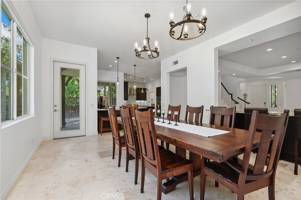 7 Wegeford Circle Ladera Ranch, CA 92694 - Photo 11 of 74 a view of a dining room with furniture window and wooden floor