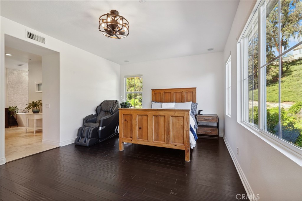 7 Wegeford Circle Ladera Ranch, CA 92694 - Photo 21 of 74 a bedroom with furniture and a window