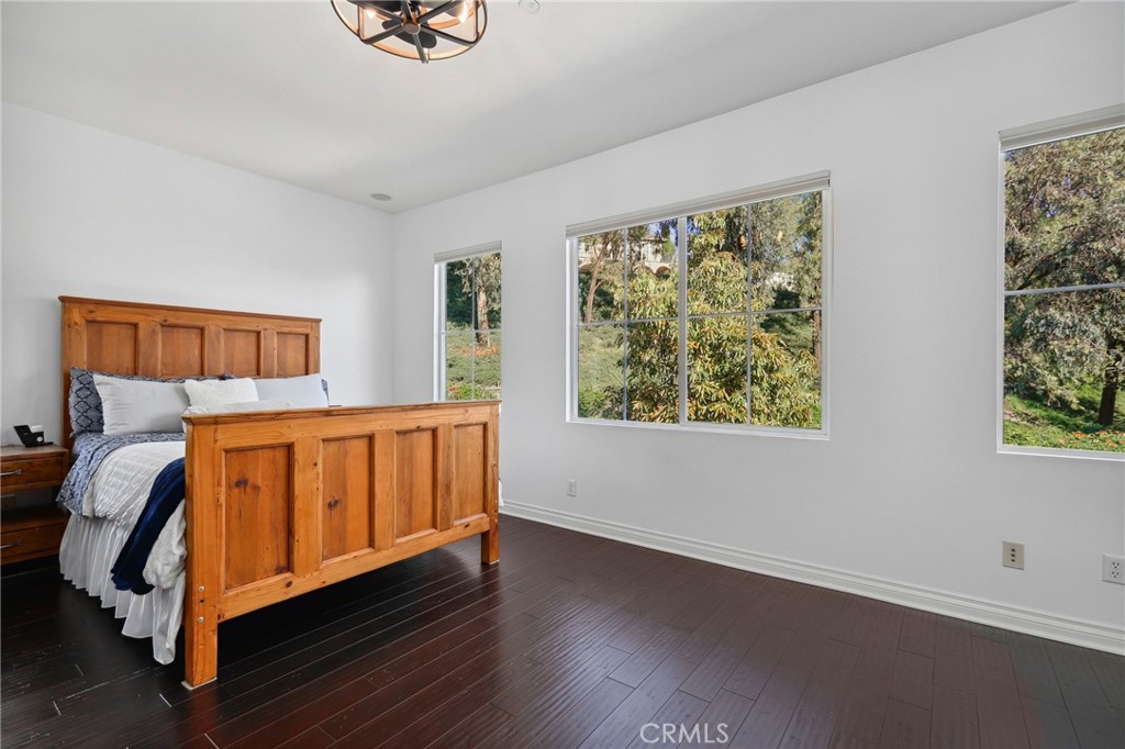 7 Wegeford Circle Ladera Ranch, CA 92694 - Photo 22 of 74 a bedroom with a bed and a window
