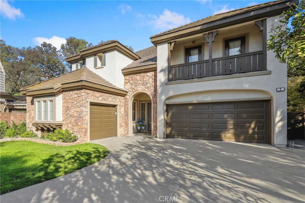 7 Wegeford Circle Ladera Ranch, CA 92694 - Photo 3 of 74 a view of a house with a yard