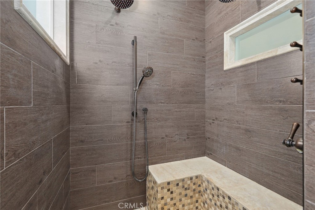 7 Wegeford Circle Ladera Ranch, CA 92694 - Photo 34 of 74 a bathroom with a shower
