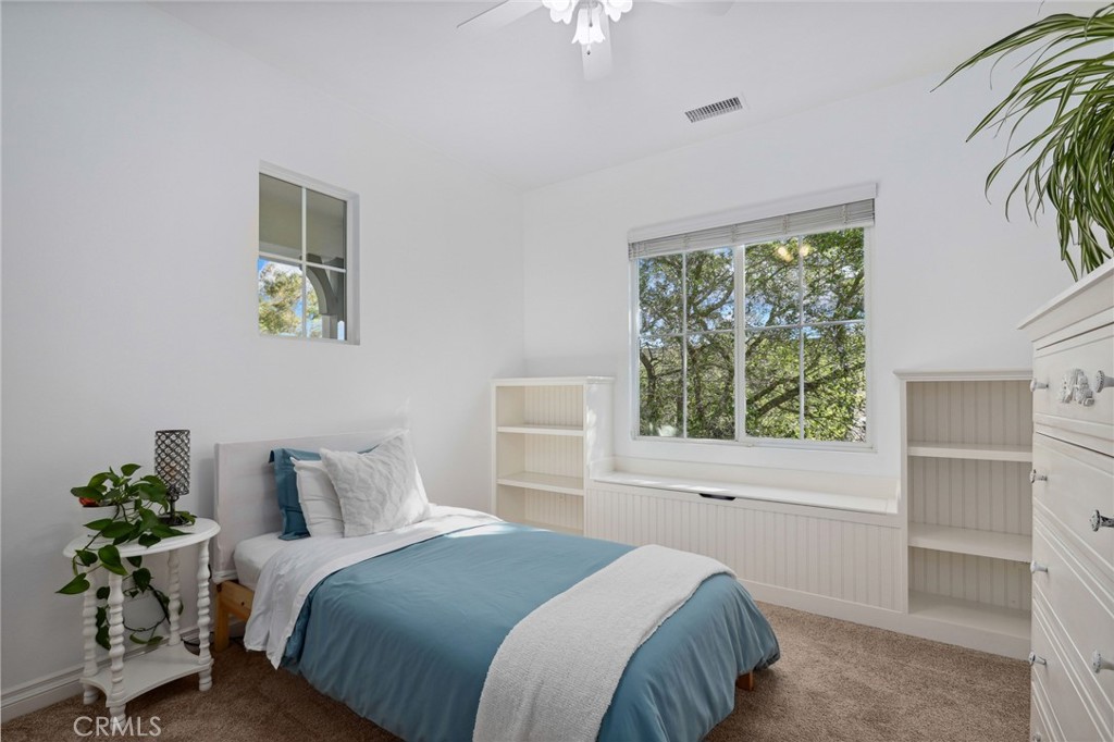 7 Wegeford Circle Ladera Ranch, CA 92694 - Photo 38 of 74 a bedroom with a bed and a window
