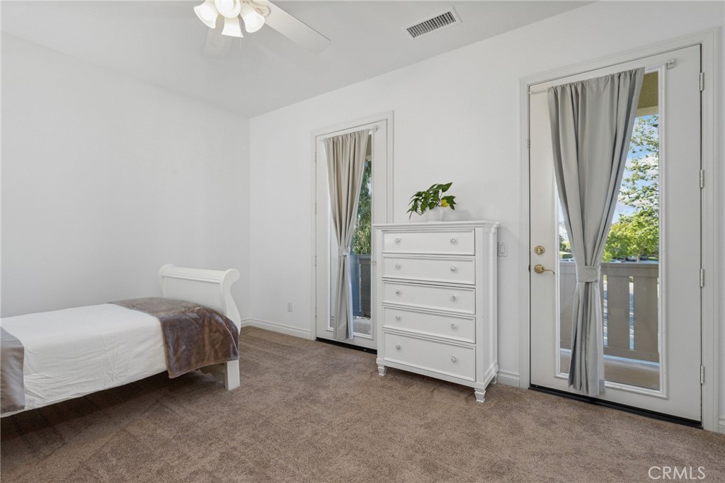 7 Wegeford Circle Ladera Ranch, CA 92694 - Photo 39 of 74 a room with a bed and a window
