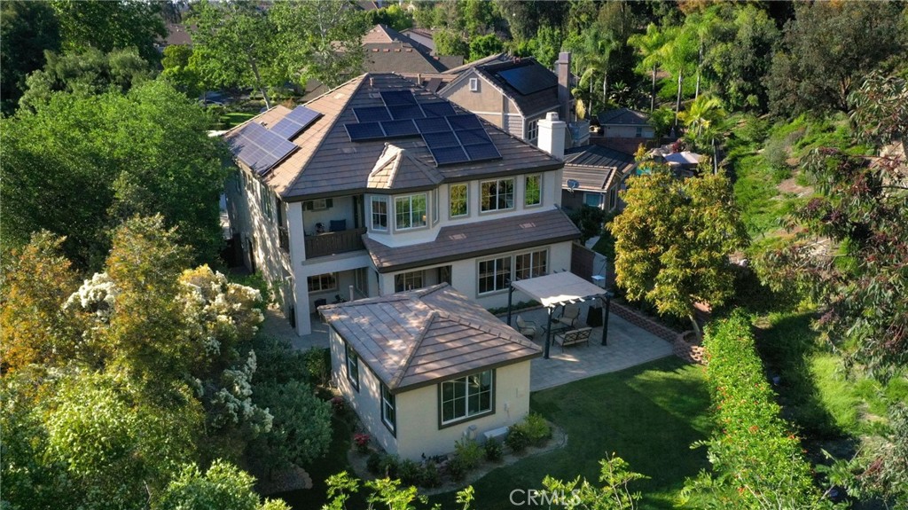 7 Wegeford Circle Ladera Ranch, CA 92694 - Photo 4 of 74 a front view of a house with garden