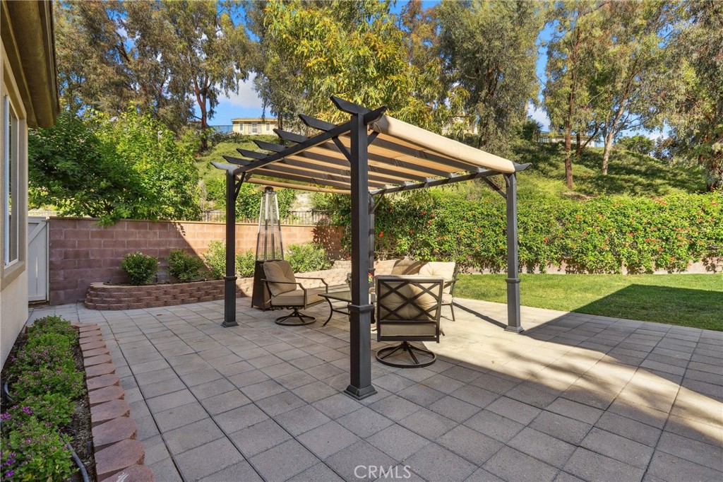 7 Wegeford Circle Ladera Ranch, CA 92694 - Photo 47 of 74 a view of a backyard with sitting area