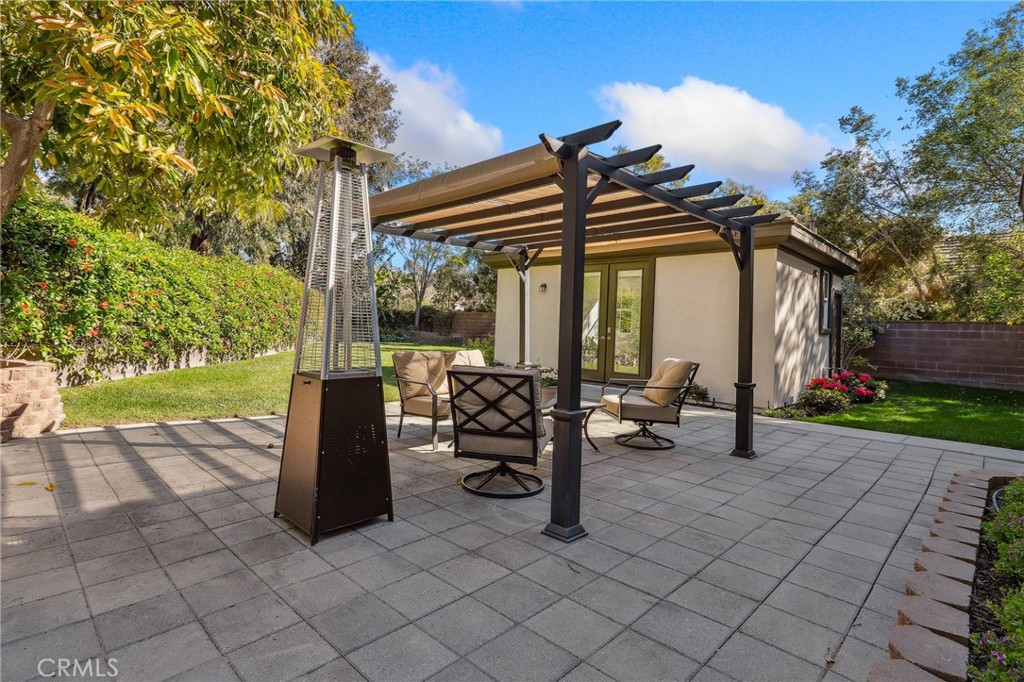 7 Wegeford Circle Ladera Ranch, CA 92694 - Photo 48 of 74 a view of patio with table and chairs and potted plants