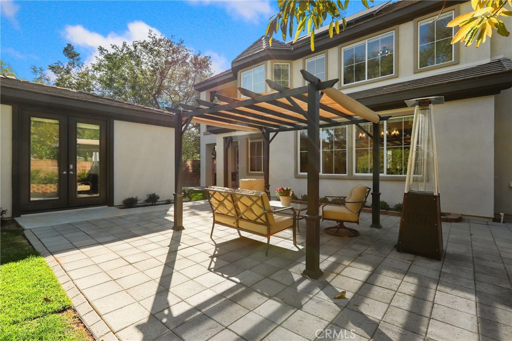 7 Wegeford Circle Ladera Ranch, CA 92694 - Photo 49 of 74 a view of a house with backyard sitting area