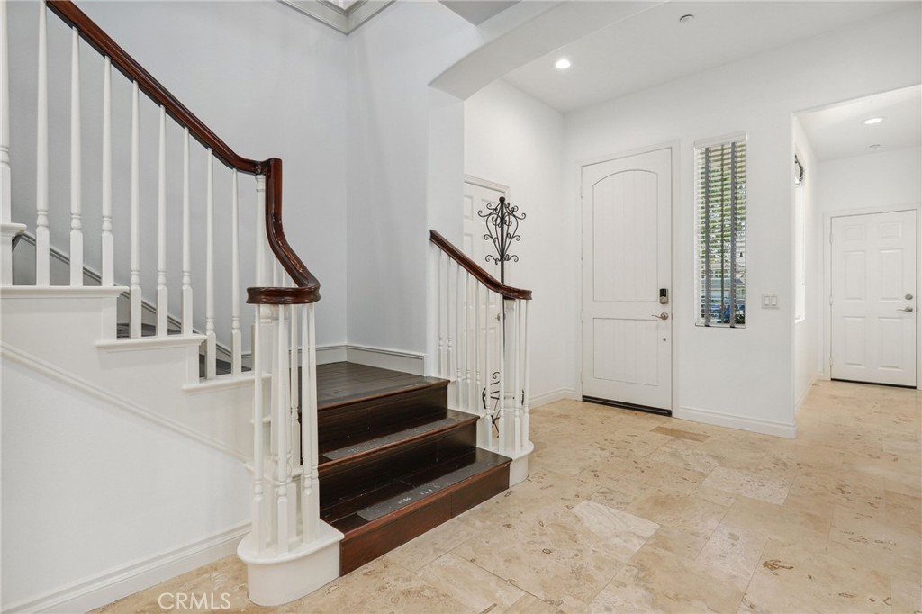 7 Wegeford Circle Ladera Ranch, CA 92694 - Photo 5 of 74 a view of entryway and hall with wooden floor