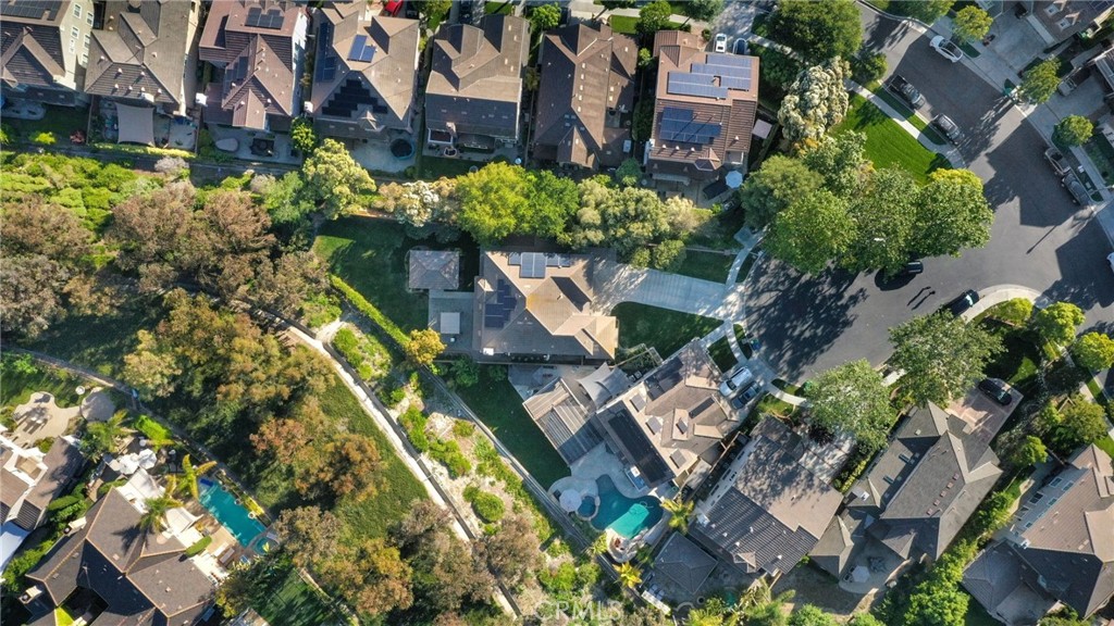 7 Wegeford Circle Ladera Ranch, CA 92694 - Photo 55 of 74 an aerial view of a house with a yard and a large tree