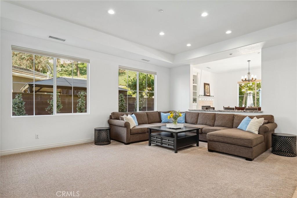 7 Wegeford Circle Ladera Ranch, CA 92694 - Photo 6 of 74 a living room with furniture and a large window