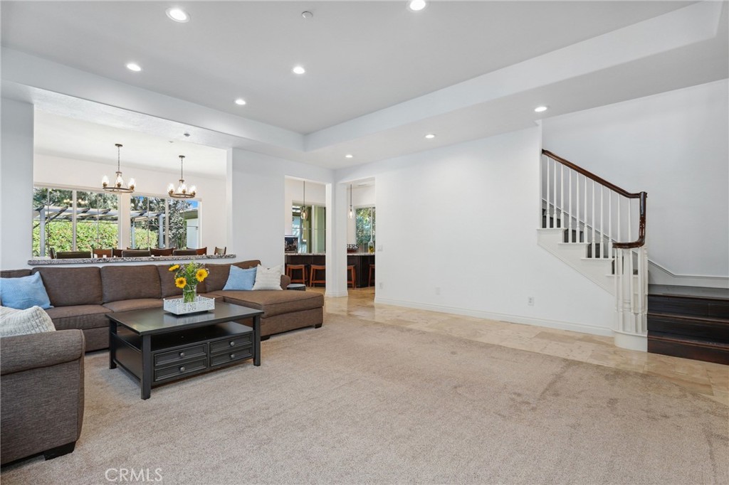 7 Wegeford Circle Ladera Ranch, CA 92694 - Photo 8 of 74 a living room with furniture and a wooden floor