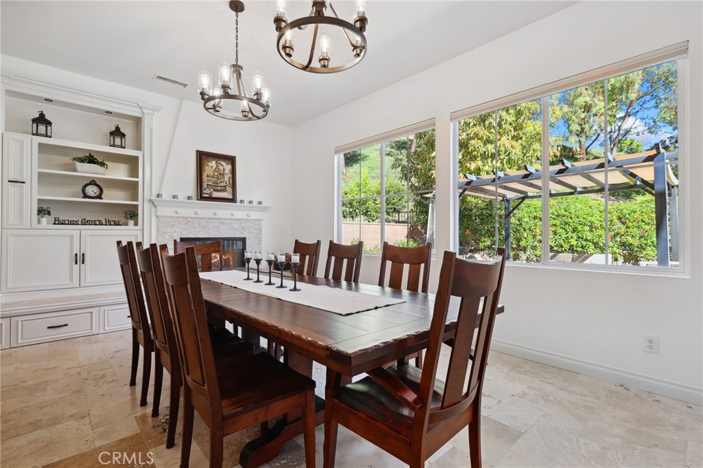 7 Wegeford Circle Ladera Ranch, CA 92694 - Photo 10 of 74 a view of a dining room with furniture window and outside view