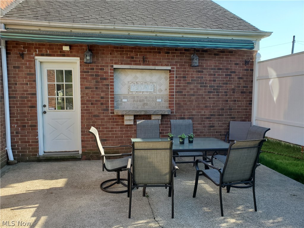1249 Blanchester Road Lyndhurst, OH 44124 - Photo 21 of 22 backyard patio w/ awning