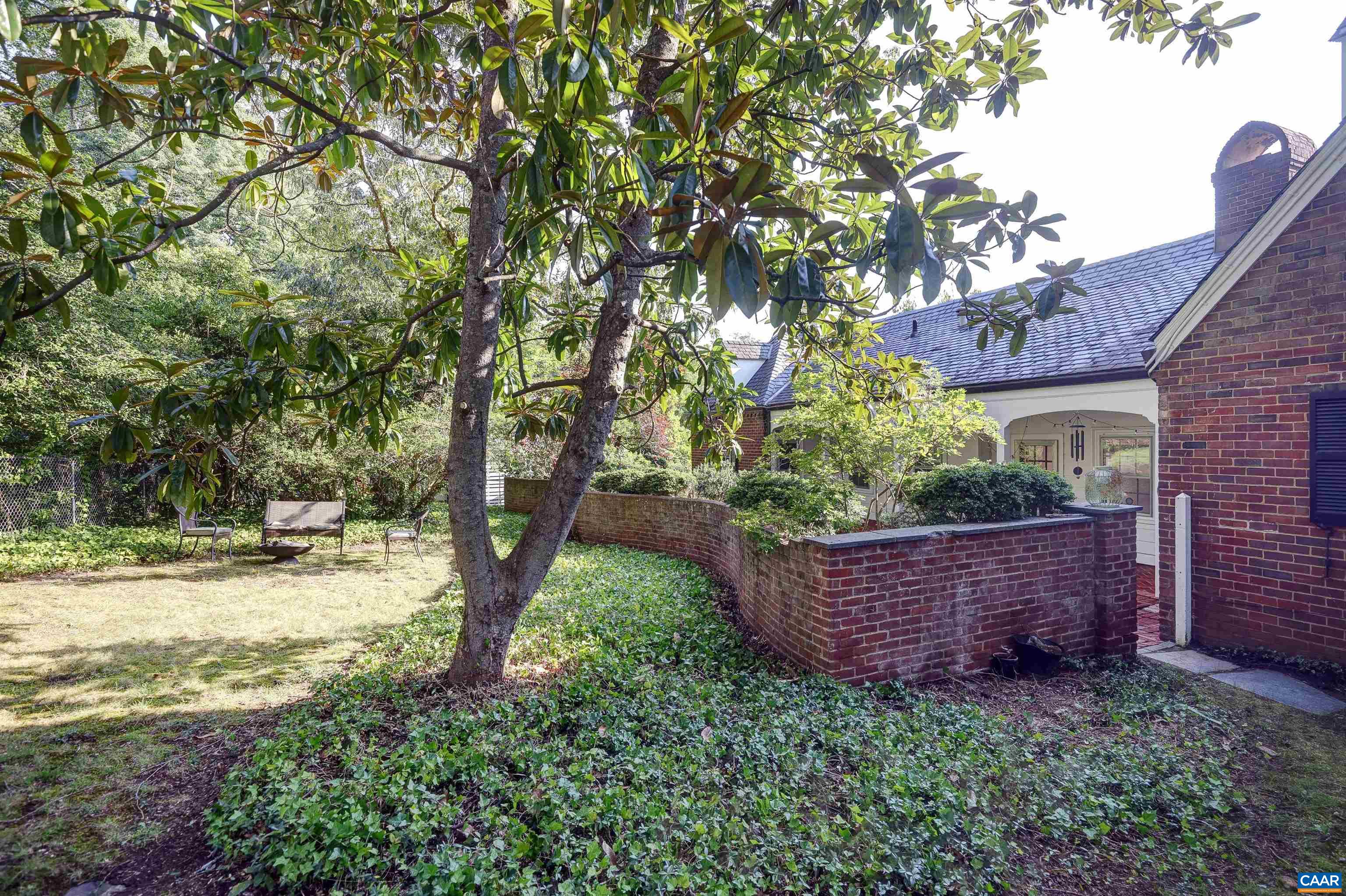 2003 Lewis Mountain Road Charlottesville, VA 22903 - Photo 13 of 19 a view of a backyard with plants and large tree