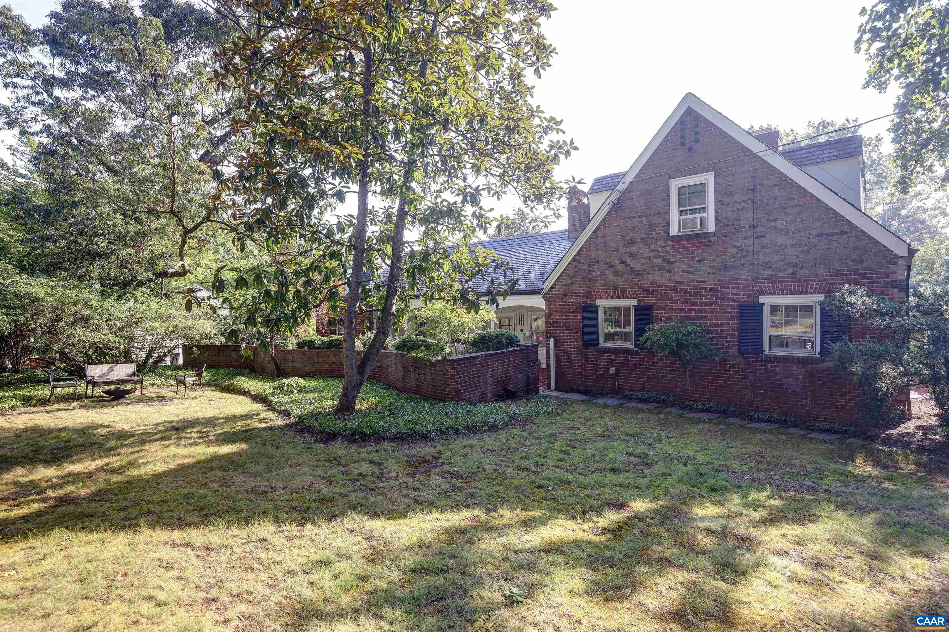 2003 Lewis Mountain Road Charlottesville, VA 22903 - Photo 14 of 19 a front view of a house with garden
