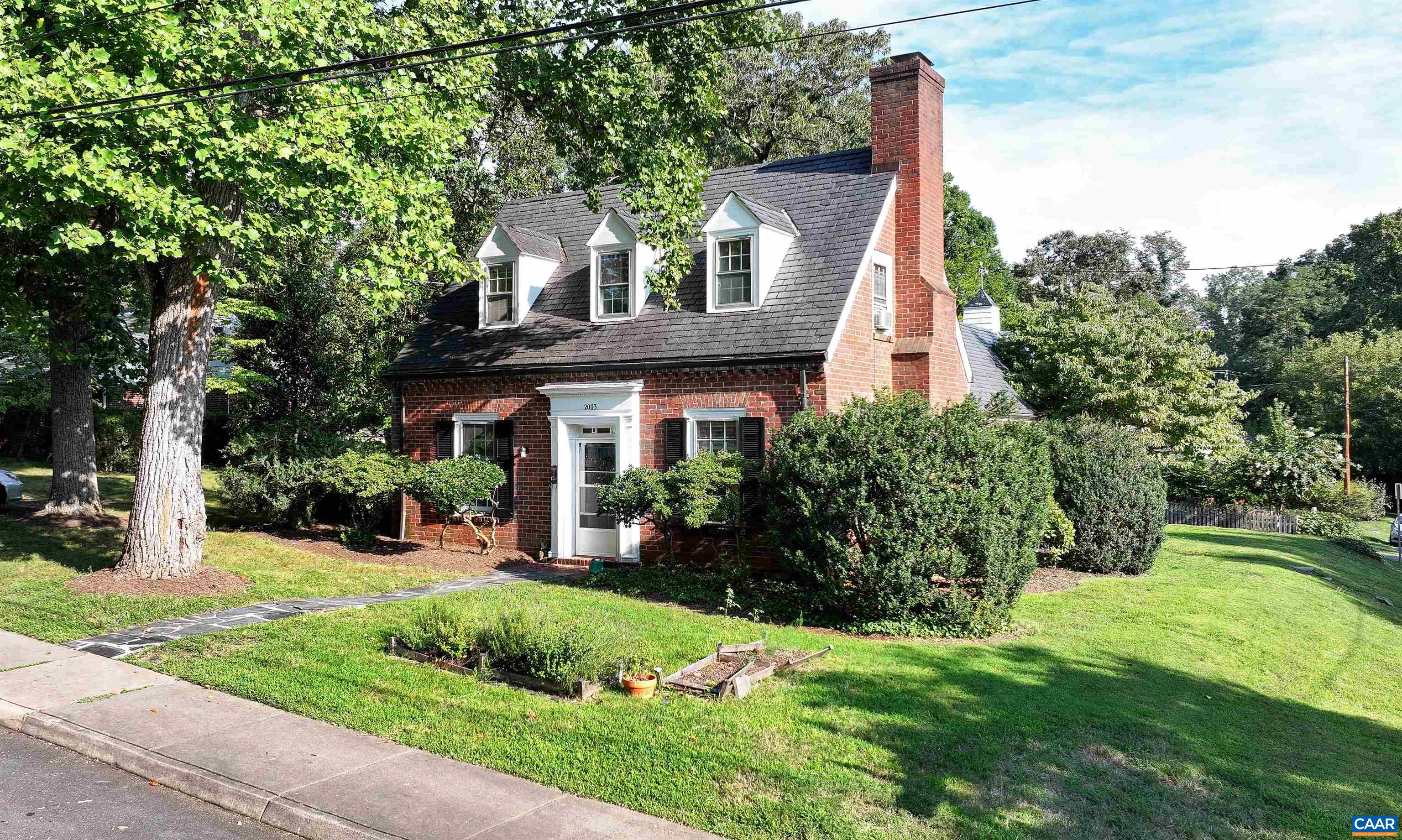 2003 Lewis Mountain Road Charlottesville, VA 22903 - Photo 2 of 19 a front view of a house with a yard