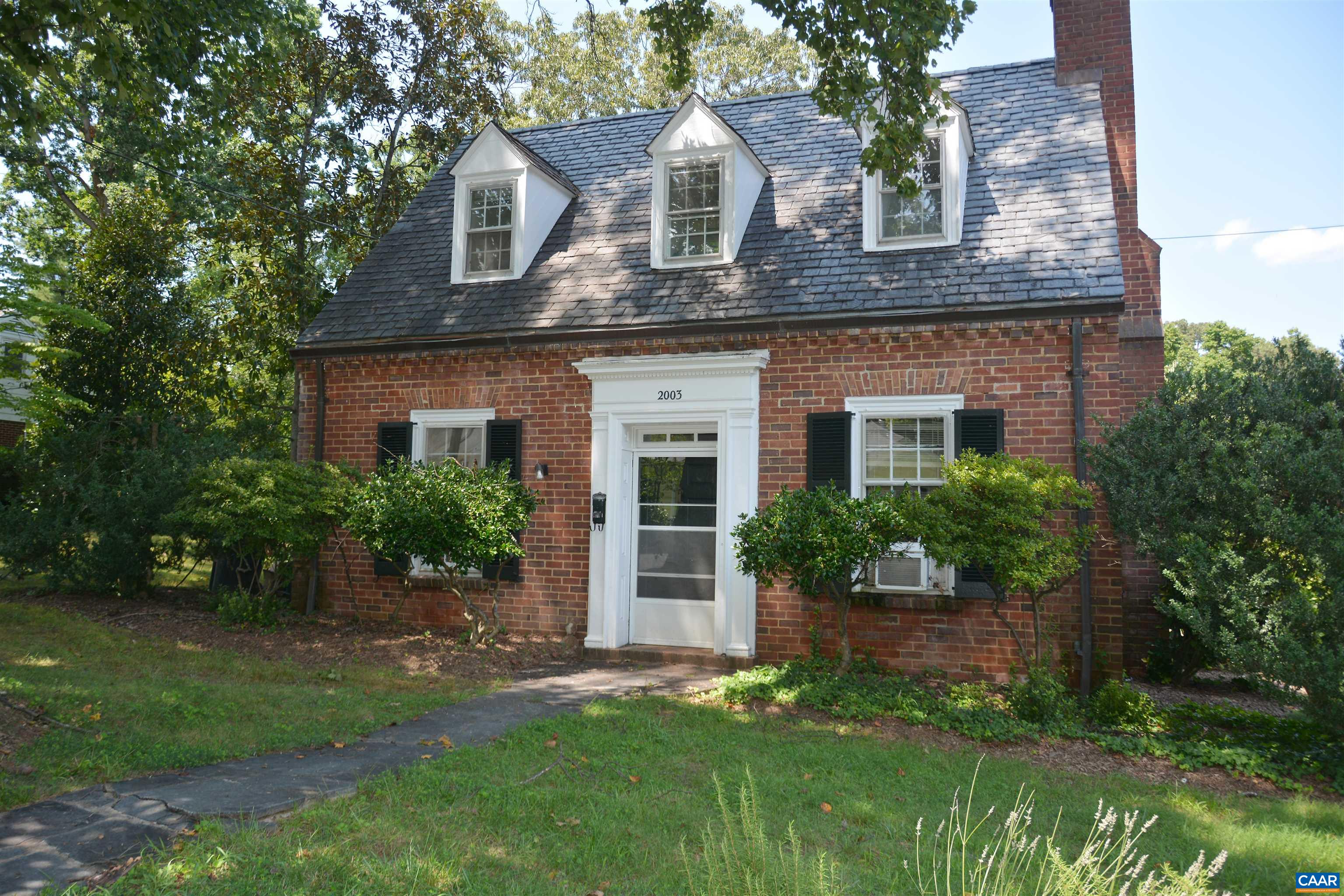 2003 Lewis Mountain Road Charlottesville, VA 22903 - Photo 3 of 19 front view of a house with a yard