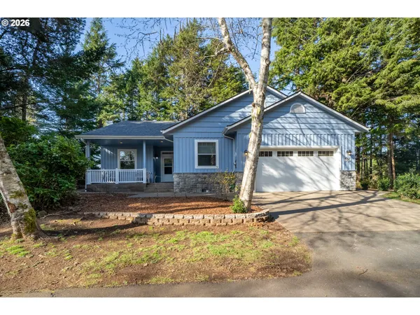 a backyard of a house with barbeque oven